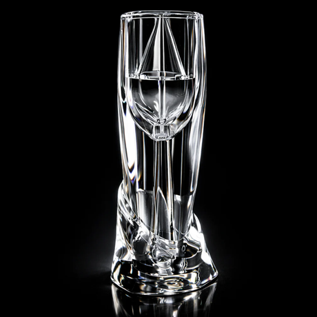 Wine aerator on a reflective black surface