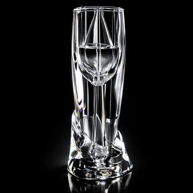 Wine aerator on a reflective black surface 